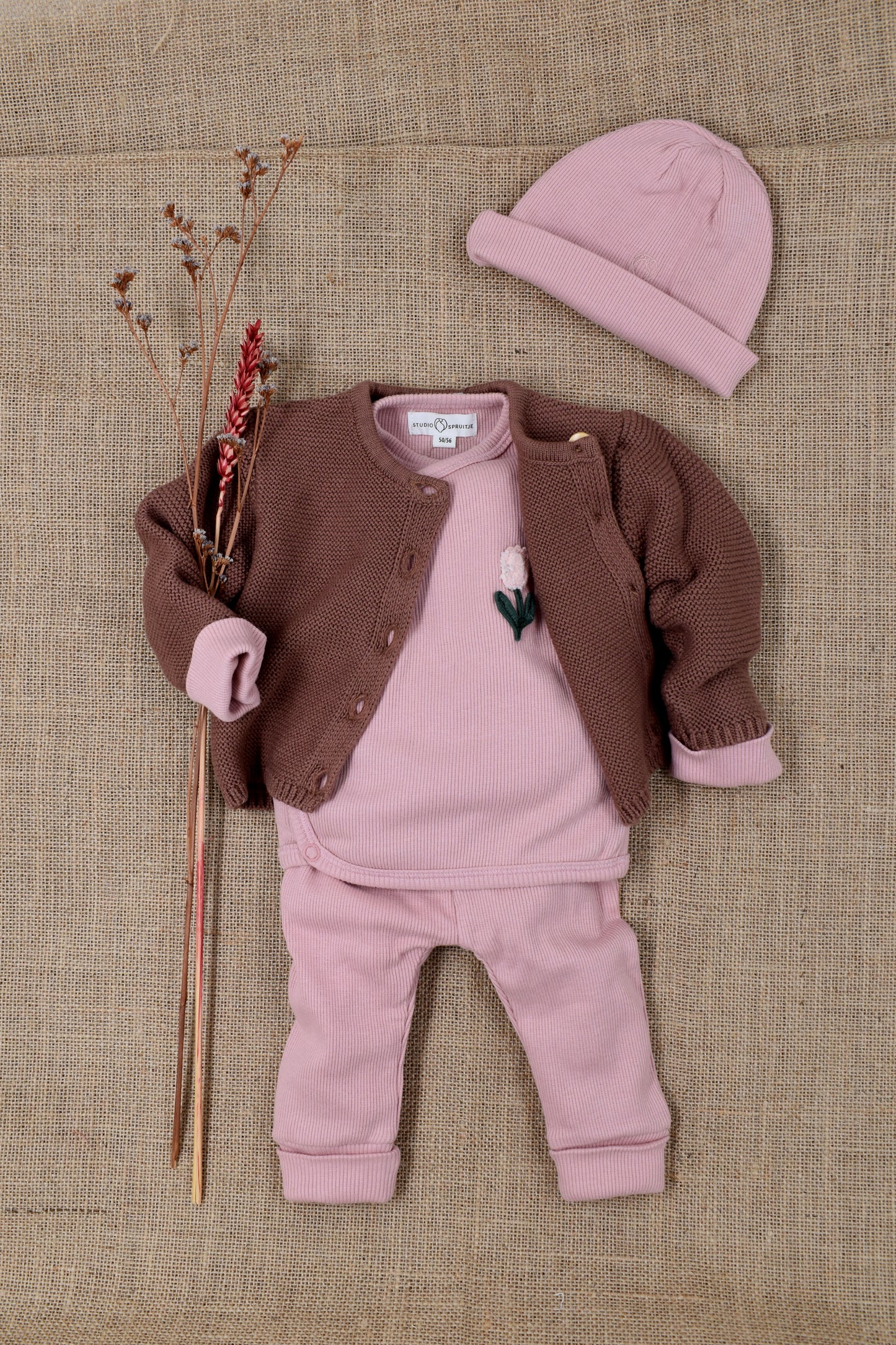 Overslagshirtje rib roze met bloem