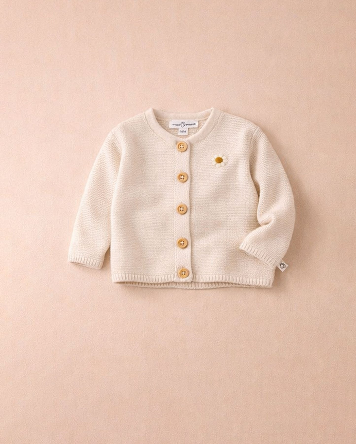 Vestje off-white met madeliefje
